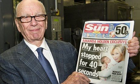 Rupert Murdoch holds up the Sun on Sunday