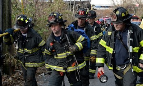 firefighters at Bronx derailment