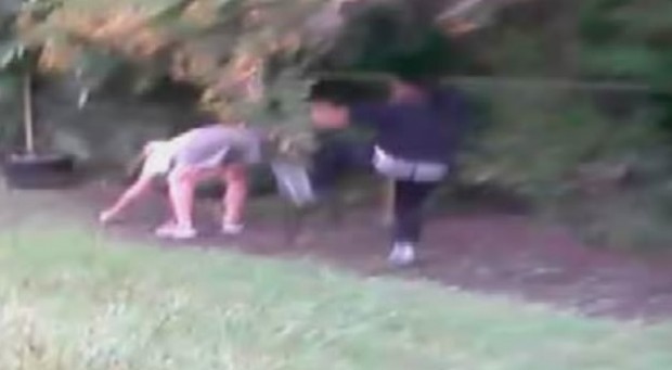 Elderly man being assaulted