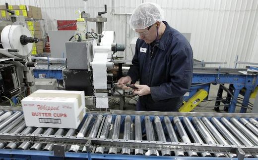Click to enlarge Butter factory line worker