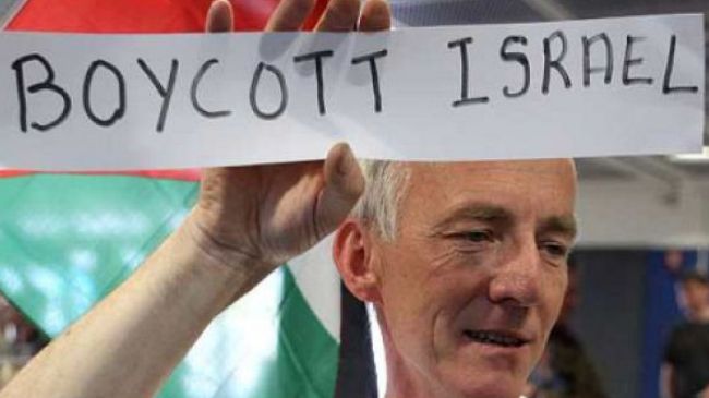  A demonstrator displays a sign reading 