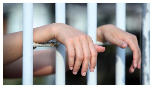 hands in jail
