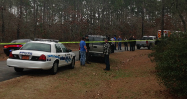 Emergency crews responded to President Drive for a officer involved shooting Sunday.
