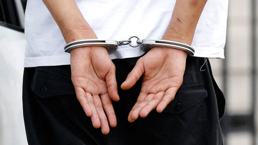 man in handcuffs