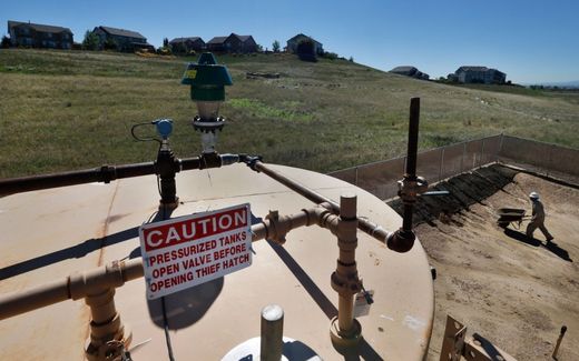 A natural gas well site near a residential neighborhood