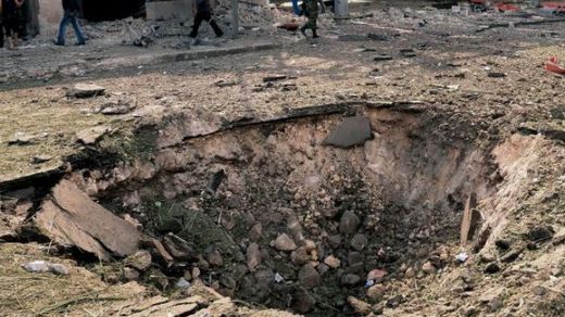 Site of a bomb explosion in Aleppo.