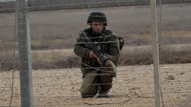 Click to enlarge Israeli soldier in Gaza