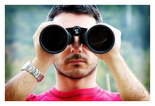 Man using binoculars
