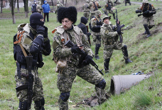 Click to enlarge Armed pro-Russian protesters