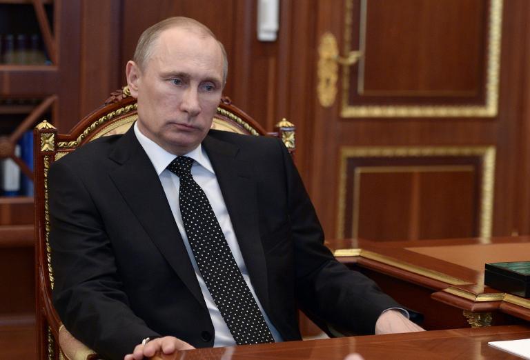 Click to enlarge Putin in Kremlin