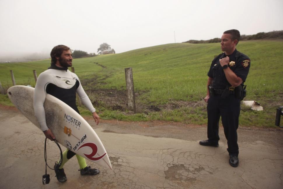 Surfer and officer