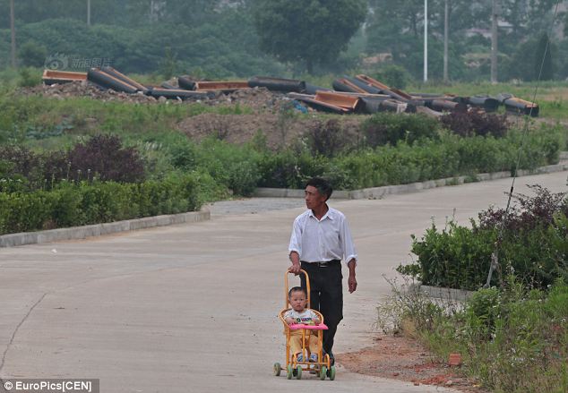 Man, stroller, smashed coffins