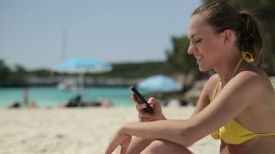 woman, cell phone at beach