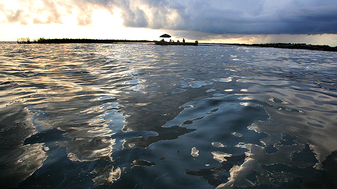 Click to enlarge OIl sheen sits on the surface