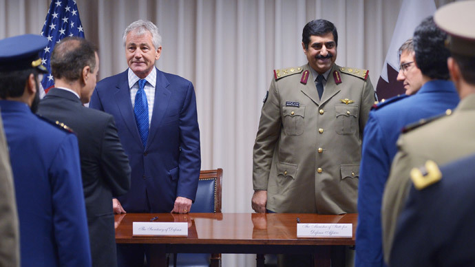 Click to enlarge Chuck Hagel (L) and Qatar's Hamad bin Ali al-Atiyah