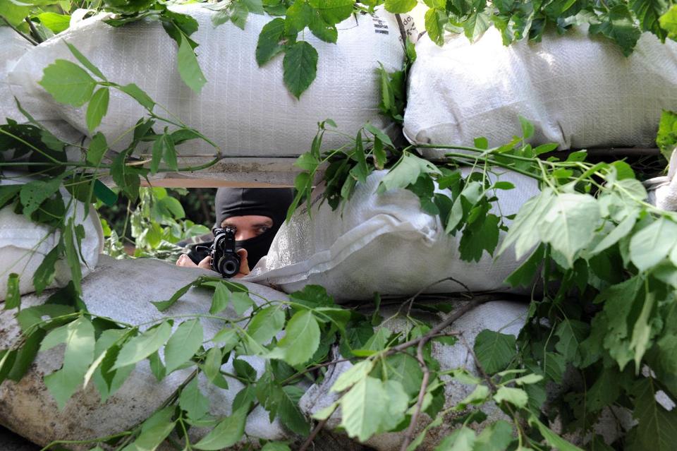 Click to enlarge Donetsk militant