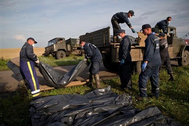 bodies loaded onto truck 