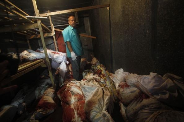 Click to enlarge corpses in refrigerators rafah
