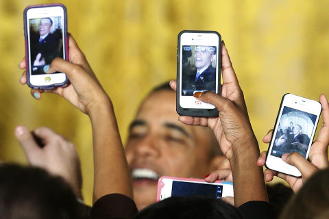 Click to enlarge obama and cell phones