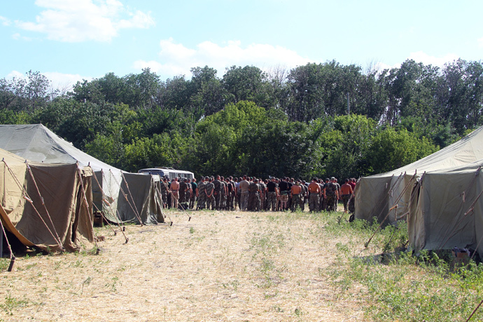 Ukrainian servicemen at a tent camp