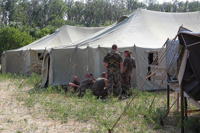 Ukrainian soldiers in a tent camp